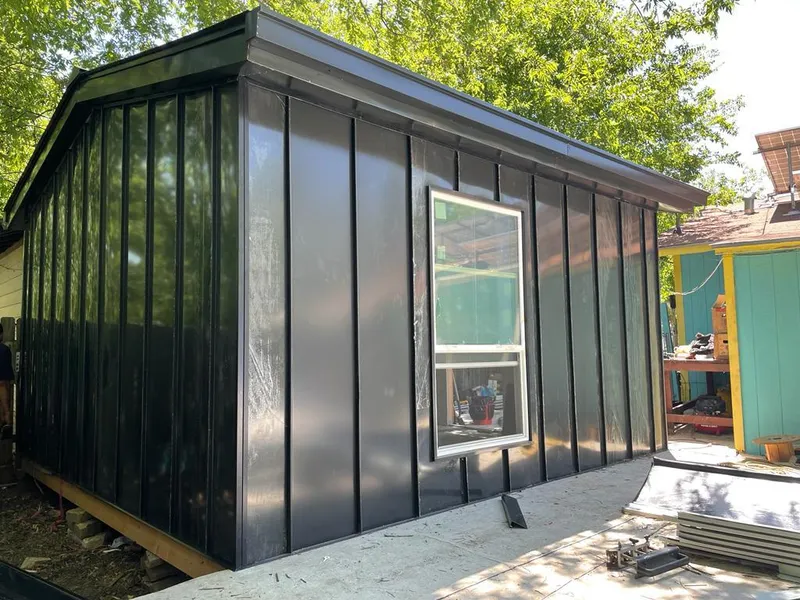 Black standing seam metal wall panels for Metal Roof Installation in Chicago Heights