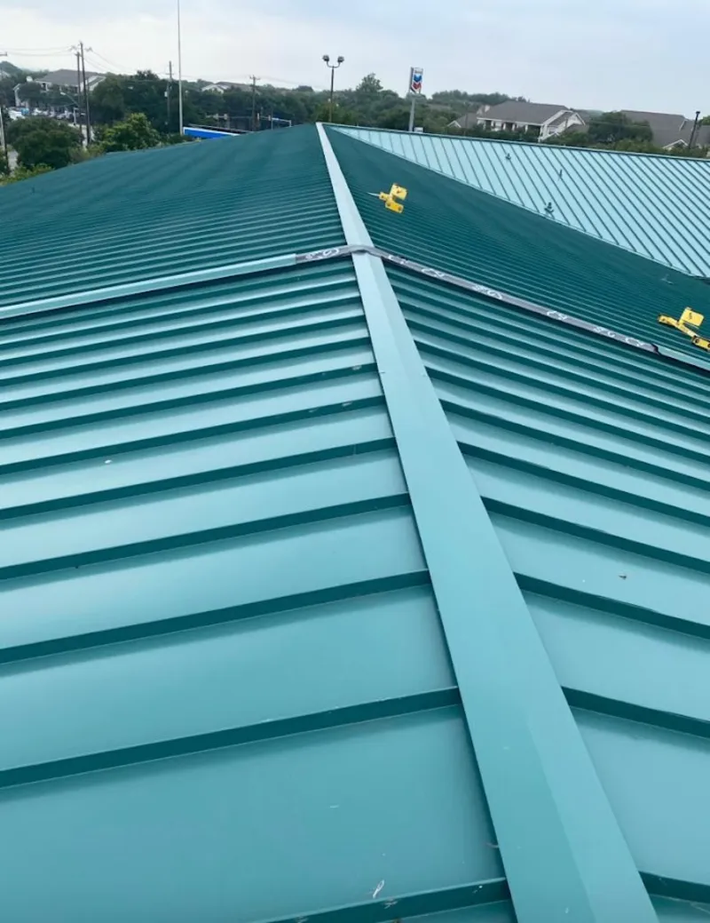 Green commercial metal roof ridge and valley for Metal Roof Repair in Chicago Heights