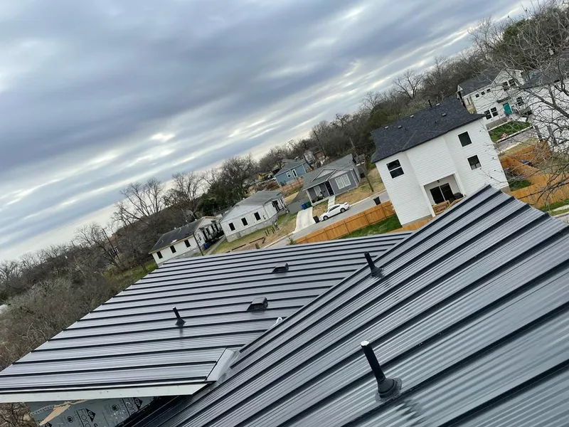 Standing seam metal roof panels with vents for Skylight Repair in Chicago Heights